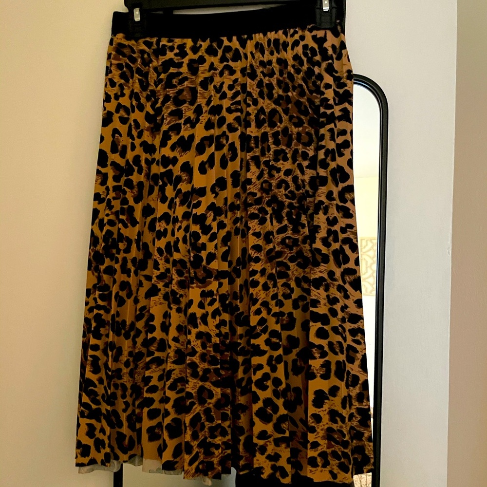 Leopard print pelted skirt.
